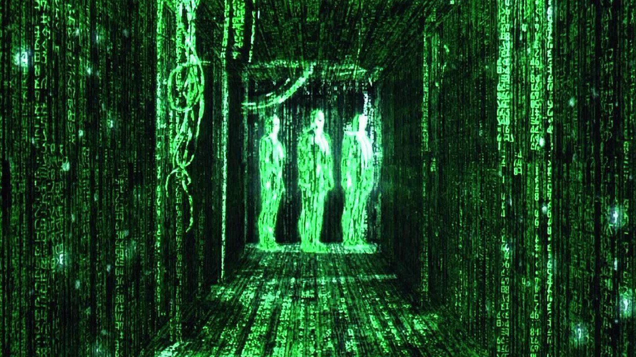 Screenshot from The Matrix showing a hallway and three people all made from stylized green glowing computer code on a black background