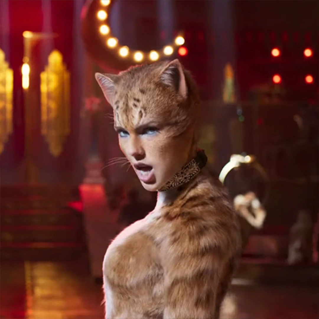 Still from Cats (2019), showing Taylor Swift, digitally altered to look like a cat, mid song looking dramatically past the camera