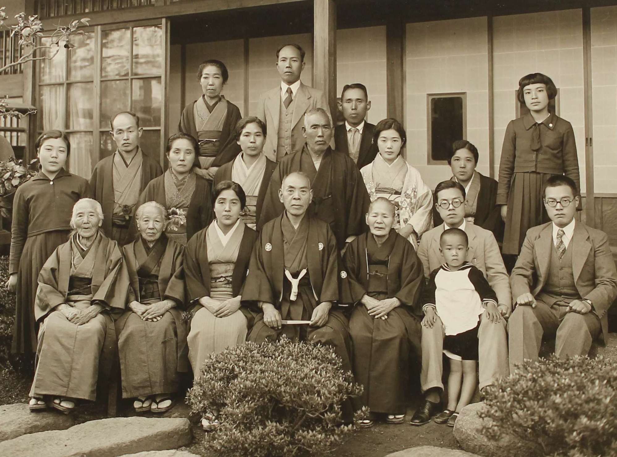 Angtique sepia photograph of a wealthy extended Japanese family